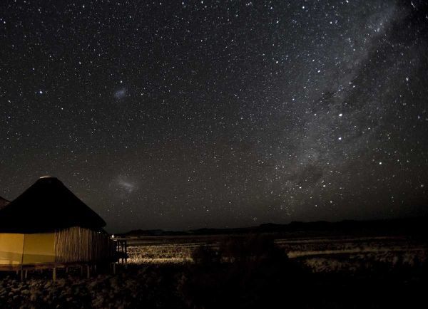 Namibia, Namib-Naukluft Park, Milky Way over Hut